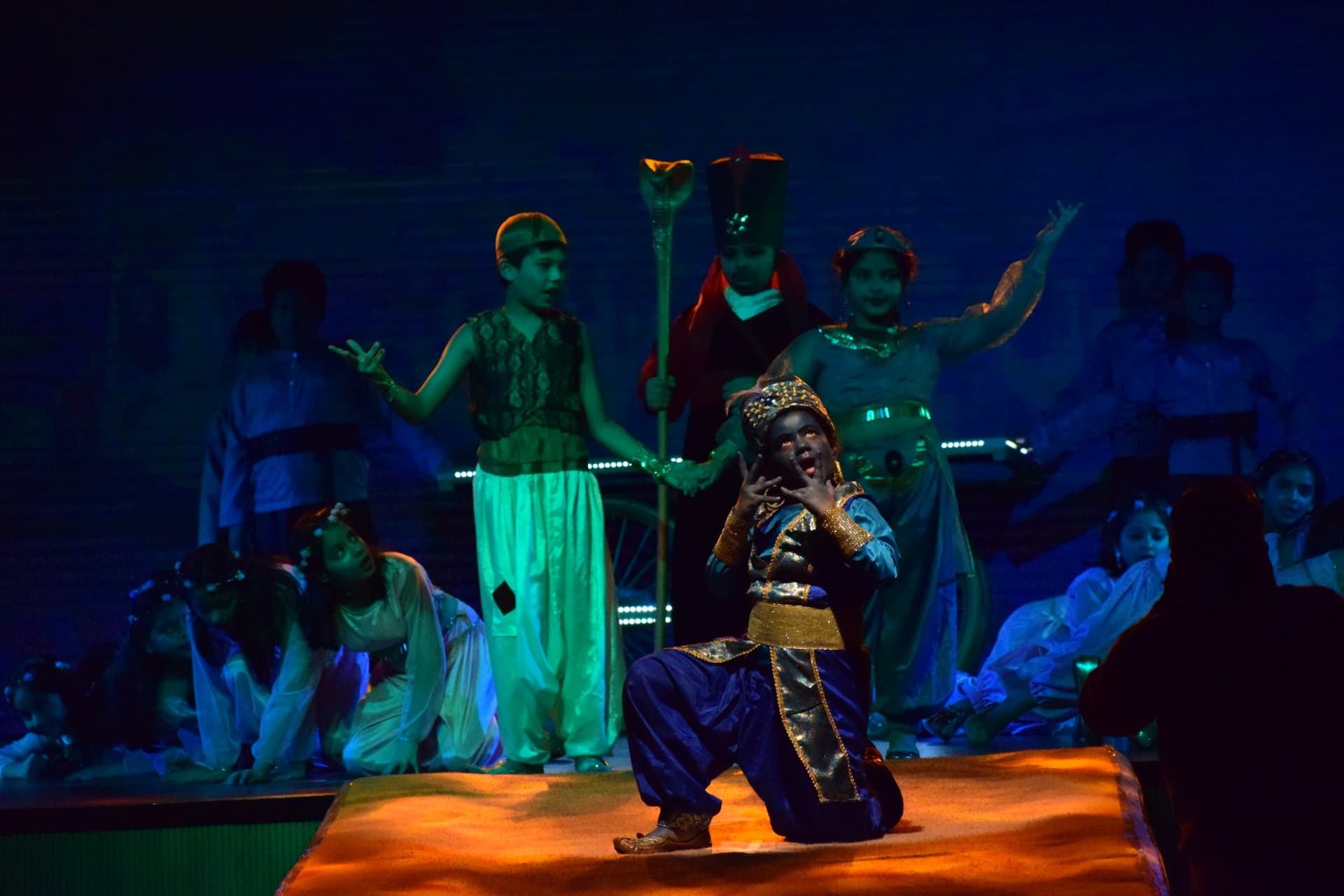 Colourful musical theatre act performed by school children